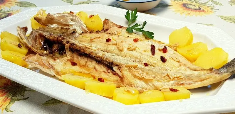 Lubina a la Donostiarra: Un Clásico de la Cocina Vasca
