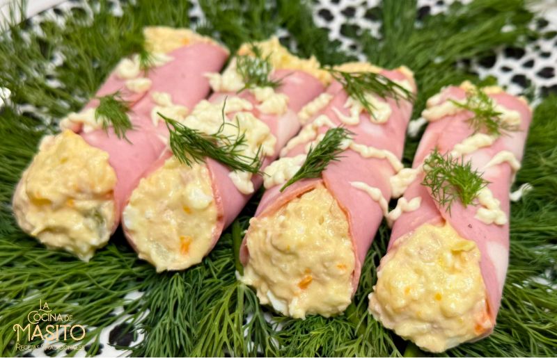 Canelones de mortadela rellenos de ensaladilla rusa, un aperitivo frío, fácil y económico, ideal para sorprender en cualquier ocasión.