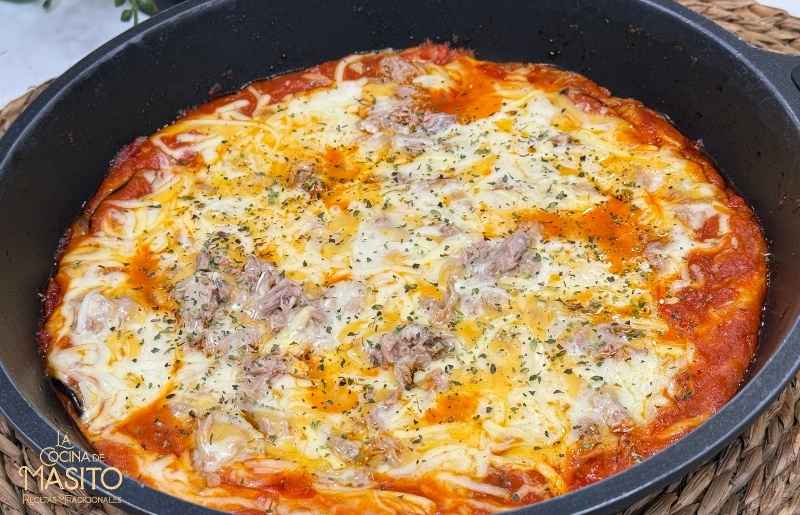 Parmigiana de atún jugosa con queso fundido